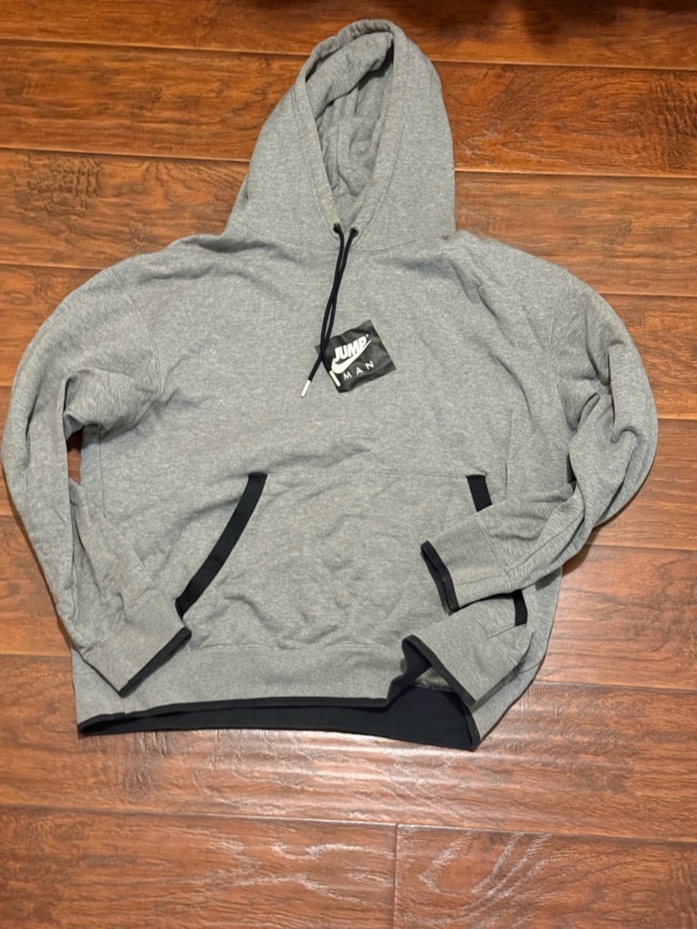 Jump Gray Pullover Hoodie with Black Logo Patch